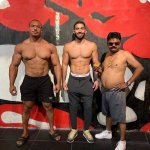 two muscular guys and a fat guy