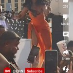 Kardi B throes mic mike