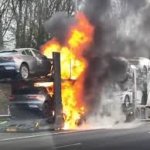 New electric car burning on car carrier template