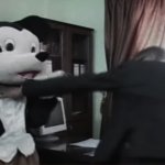 mickey mouse being beat to death