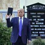 Trump holding Bible