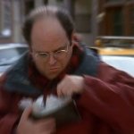 GEORGE COSTANZA DIGGING IN HIS GIANT WALLET