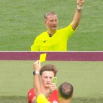 Player counters yellow card from referee with Uno reverse card