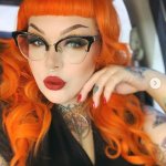 sexy girl with orange hair and glasses