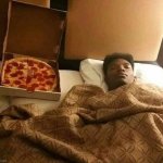 MAN AND PIZZA IN BED