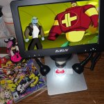 Ozzy&drix being played on a microscope