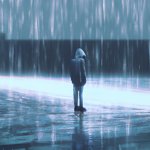 a boy standing in the rain alone not feeling accepted