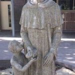 St Martin de porres is just holding a bread, like a dirt mind | "IT'S JUST A SAINT"; THE SAINT: | image tagged in catholic priest and child | made w/ Imgflip meme maker