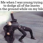 “Impossible” | Me when I was young trying to dodge all of the leaves on the ground while on my bike: | image tagged in bullet dodge | made w/ Imgflip meme maker