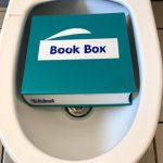 QuickBooks software box sitting on a toilet bowl