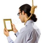 Guy looking at photo with noose