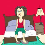 woman sitting on a bed angry