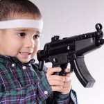 kid holding gun meme