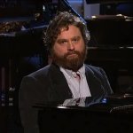 ZACH GALIFIANAKIS AT THE PIANO