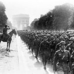 German soldiers march near the Arc de Triomphe in Paris