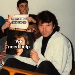 phillip and greg holding up help signs
