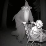 Gandalf pushing Gollum in shopping cart