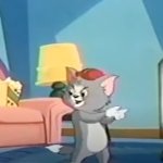 Tom happy at TV while Jerry sad at TV