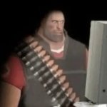 heavy from tf2 looking at computer