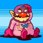 Wario Man sitting