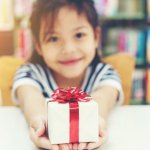 Child giving gift