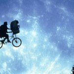 ET and Elliot on a bike