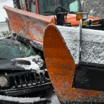 Car meets plow