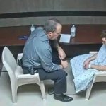 INTERVIEWING A CRAZY MAN IN A HOSPITAL GOWN