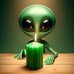 Alien holding green market candle