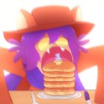 Niko devouring pancakes