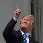 Trump stares at Eclipse and is blinded