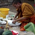 Monk eats duck