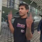 Border Invader Flips off America