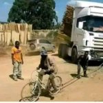 Bike pulling a truck