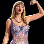 Taylor Swift makes a fist