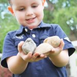 Young boy with rocks geologist rock hound JPP