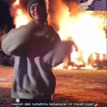 Girl dancing in front of a house on fire GIF Template
