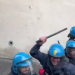 Italian cops beating students