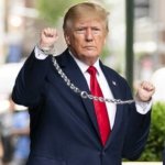 Trump handcuffed