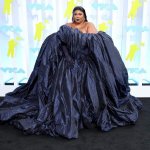 Lizzo wearing a tarp