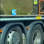 Truck securing one carton