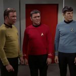 Captain Kirk, Scotty and Spock looking to the right