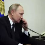 Vladimir Putin on the phone