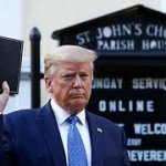 Trump HOLDING A BIBLE