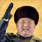 smiling kim jong un