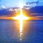 An ocean sunset cross