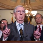 Mitch McConnell finger signs