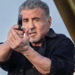 Sly Stallone firing pistol