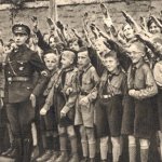 german children give hitler the nazi salute