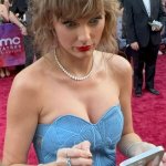 Taylor staring at phone meme